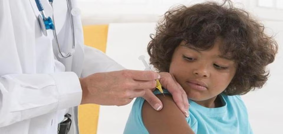 Indian child receiving measles vaccine