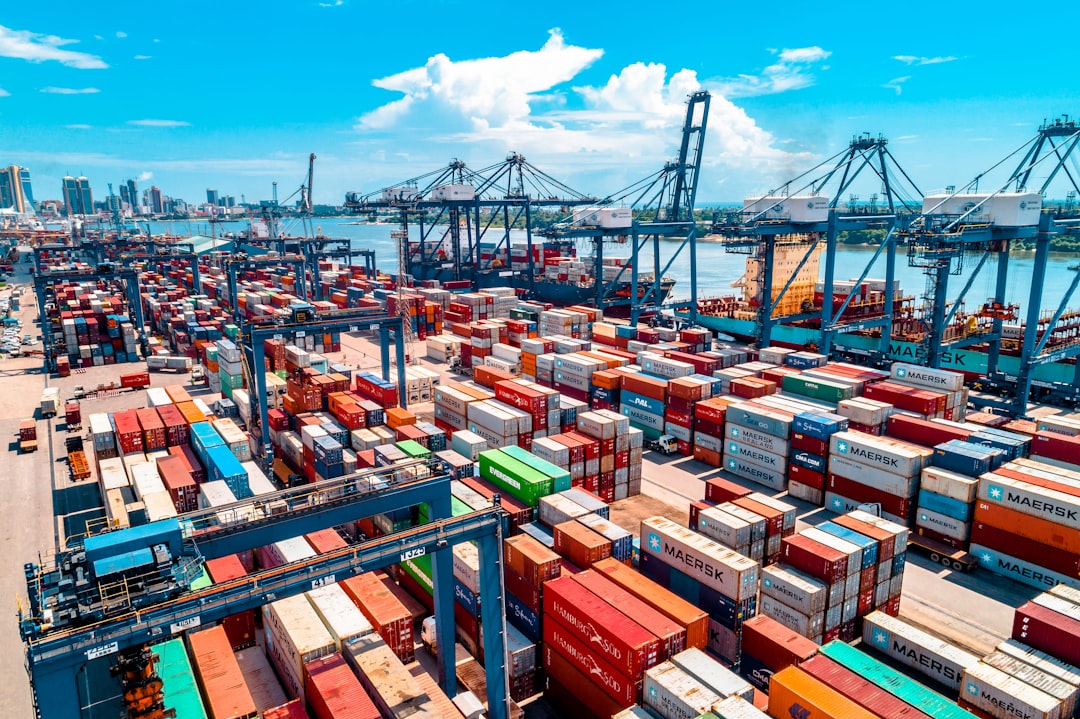 Shipping containers stacked at a cargo port