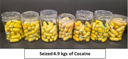 Jars of yellow capsules containing cocaine seized by DRI at Hyderabad airport